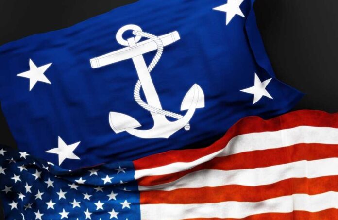 shutterstock_2046789797.jpg featured image USA Navy and American flags together.