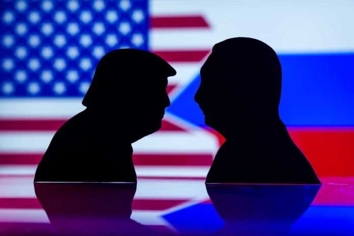 shutterstock_2543460921.jpg featured image Silhouettes of Donald Trump and Vladimir Putin with USA and Russia flags