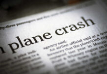 Newspaper headline about a plane crash.