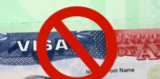 US visa with prohibition symbol overlay