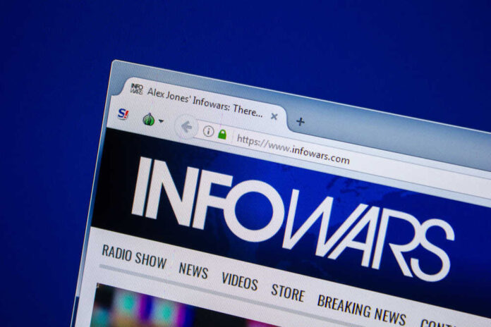 shutterstock_1143612194.jpg featured image Infowars website tab open in browser window