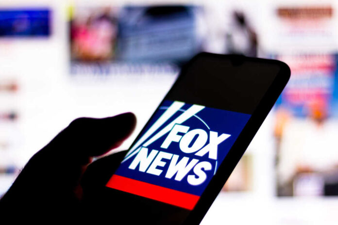 shutterstock_1756761830.jpg featured image Smartphone showing Fox News logo on screen