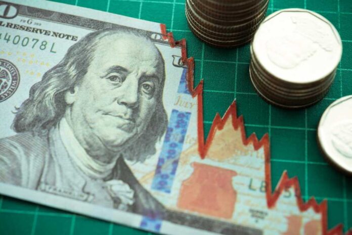 shutterstock_2172822511.jpg featured image One hundred dollar bill and coins with stock market graph.