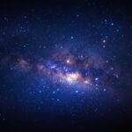 Starry night sky with bright Milky Way galaxy