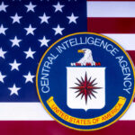 CIA emblem over United States flag background