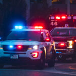 BLOODY CHAOS Hits Savannah Mall! Police car and ambulance with flashing lights nighttime