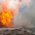 BOMBSHELL EXPLOSIONS Rock Peaceful Town! – VIDEO A large explosion with flames and smoke.