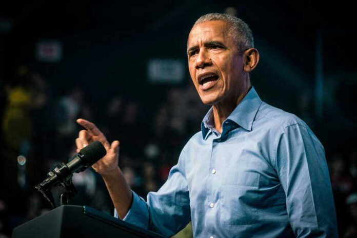 shutterstock_2230017639.jpg Barack Obama speaks at podium.