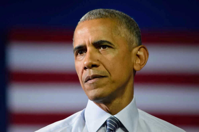 Barack Obama in front of flag