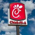 Chick-fil-A Ban STUNS Teens Chick-fil-A restaurant sign against a blue sky with clouds