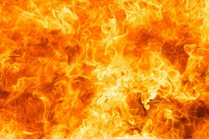 Bright orange and yellow flames burning intensely