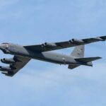 DEVELOPING: Trump Orders B-52 Bombers Into Action B-52 bomber flying against a blue sky