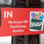 Trump’s SNAP Overhaul: A New Era for Farmers Sign on a store door indicating acceptance of EBT food stamp benefits
