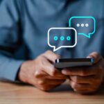 Trump DEMANDS Five Years Social Media History Person holding a smartphone with chat bubbles above