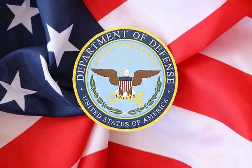 Department of Defense emblem on an American flag background