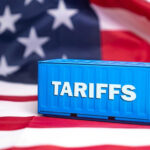 $200 Billion Refund DISASTER Looms Over Tariff War Shipping container reading tariffs on the American flag