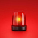 11 Million Sick — Hospitals REACH Breaking Point Red emergency light on red background