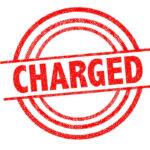 Emmy Winner CHARGED — Child Abuse SCANDAL! Red charged stamp with circular border