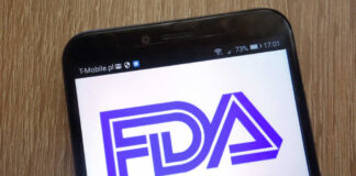 Close-up of a smartphone displaying the FDA logo