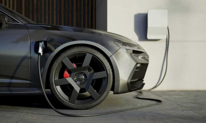 Electric car charging at a station.