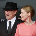 Spielberg’s Move: Tax Dodge or Family Focus? Steven Spielberg and Amy Ryan smiling at a red carpet event