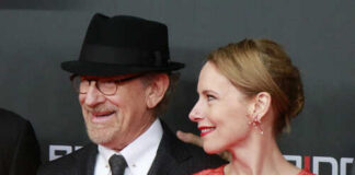 Steven Spielberg and Amy Ryan smiling at a red carpet event