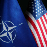 NATO flag and United States flag side by side.