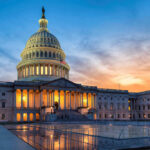 U.S. Capitol building at sunset with reflection, Washington D.C.