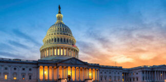 U.S. Capitol building at sunset with reflection, Washington D.C.