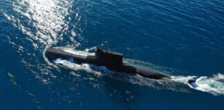 A submarine navigating through the ocean waters