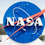 NASA Satellite CRASHES Into Earth NASA logo displayed prominently against a blue background