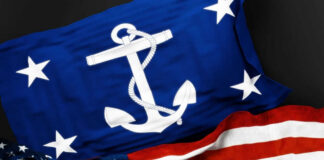 USA Navy and American flags together.