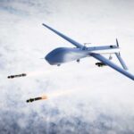 Military drone releasing missiles in the sky