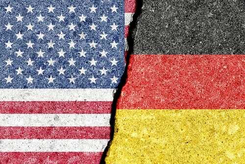 Torn representation of the American and German flags