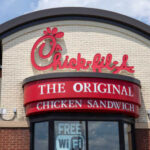 Exterior view of a Chick-fil-A restaurant featuring a prominent sign