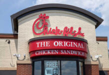 Exterior view of a Chick-fil-A restaurant featuring a prominent sign