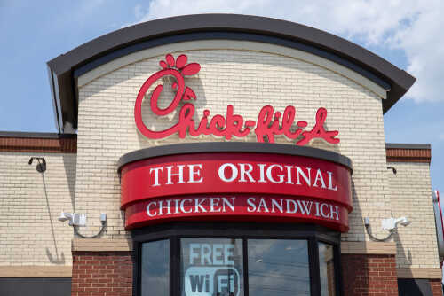 shutterstock_1401713060 (1).jpg Exterior view of a Chick-fil-A restaurant featuring a prominent sign