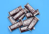 A pile of Hershey's milk chocolate bars on a blue background