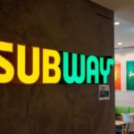 Subway SHOCKS Fast-Food Industry With $5 Gamble Illuminated Subway restaurant sign with green and yellow colors