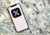 Smartphone displaying the X logo on a background of hundred dollar bills