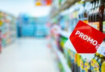 Promotional sign in a grocery store beverage aisle