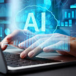 Person typing on laptop with AI hologram