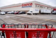 Shopping cart in front of a Costco Wholesale store