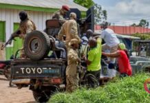 Angry crowd sets Ebola hospital tents on fire in DR Congo