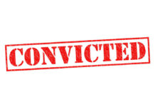 Red stamped text convicted on white background