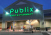 Exterior view of a Publix grocery store at dusk
