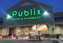 Exterior view of a Publix grocery store at dusk