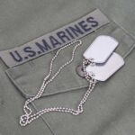 VIDEO: Trooper, Marine Veteran Stop Shooter Close-up of a U.S. Marines uniform with dog tags