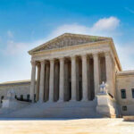 Voter Map CRUSHED by Supreme Court! U.S. Supreme Court building exterior under blue sky.