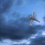 Spy Planes Swarm Cuba’s Coast An airplane flying through a cloudy sky